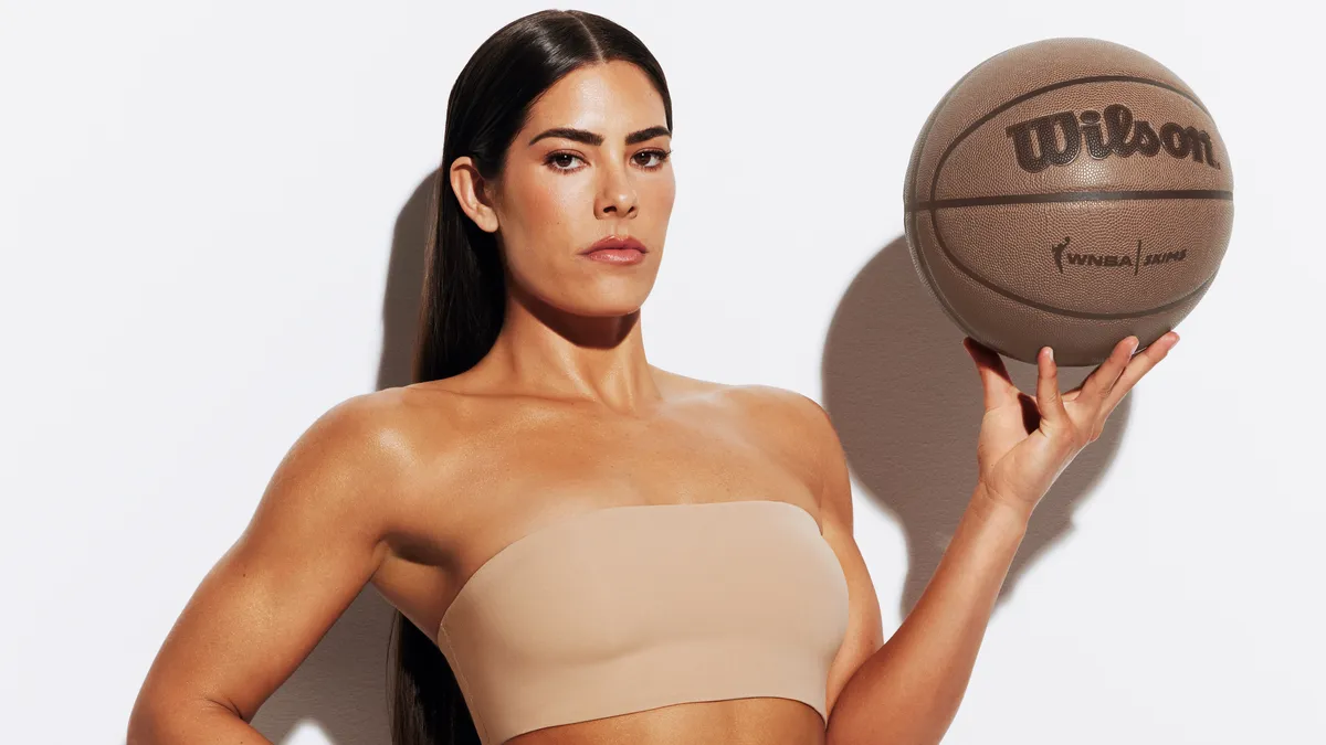 Kelsey Plum posing in Skims' latest campaign