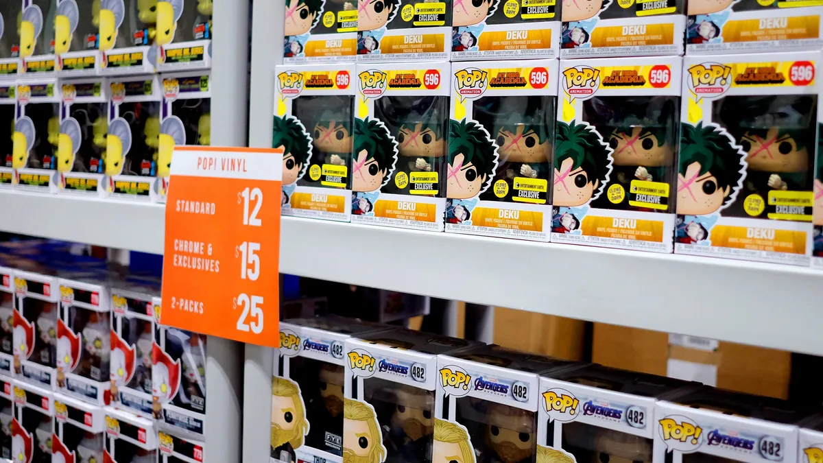 Funko Pop! bobble-heads are displayed on shelves