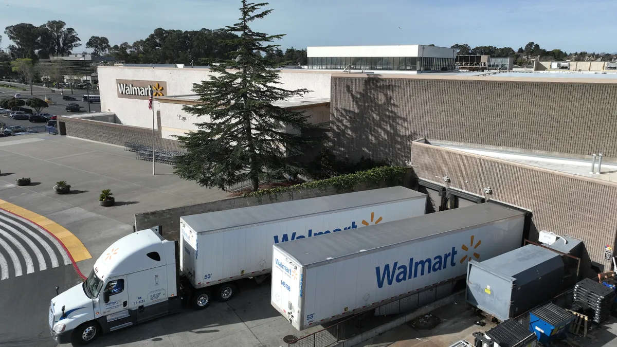 Trucks sit parked in front of a Walmart store on February 21, 2023 in Richmond, California.